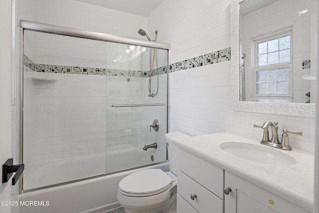 5 Maplecrest Ct, Toms River, NJ 08753 - full bath with vanity, tile walls, combined bath / shower with glass door, and backsplash