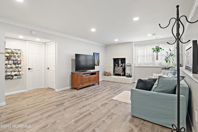 5 Maplecrest Ct, Toms River, NJ 08753 - living room with crown molding, recessed lighting, light wood-style floors, and a fireplace