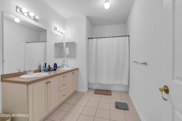 215 Sloan Ct, Matawan, NJ 07747 - full bath with double vanity, tile patterned flooring, and shower / bath combo