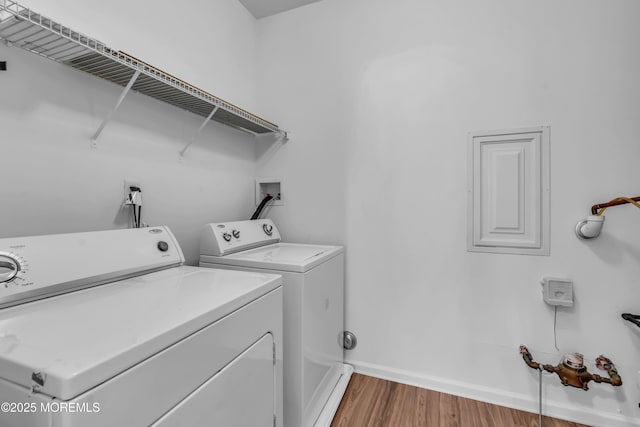 215 Sloan Ct, Matawan, NJ 07747 - washroom featuring washing machine and clothes dryer and wood finished floors