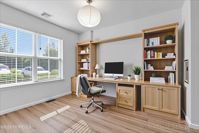 215 Sloan Ct, Matawan, NJ 07747 - home office with light wood-style flooring and baseboards