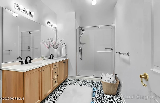 215 Sloan Ct, Matawan, NJ 07747 - bathroom featuring a shower with door, double vanity, and tile patterned flooring