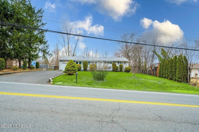 1272 Aldrich Rd, Jackson, NJ 08527 - ranch-style home with driveway, an attached garage, and a front lawn