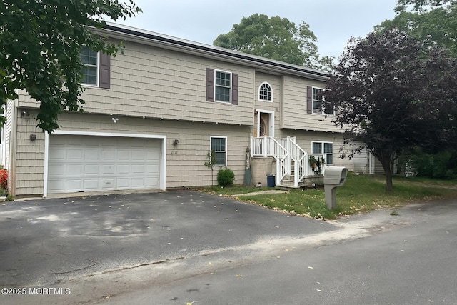 2132 Patton Rd, Toms River, NJ 08753 - split foyer home featuring an attached garage and driveway