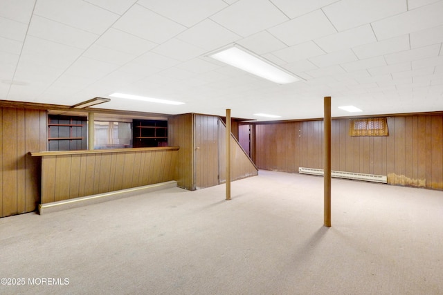 7 Tabor St, Little Silver, NJ 07739 - finished below grade area featuring baseboard heating, carpet flooring, wood walls, and a bar