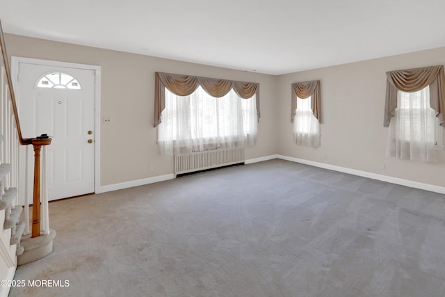 7 Tabor St, Little Silver, NJ 07739 - carpeted entrance foyer with radiator and baseboards