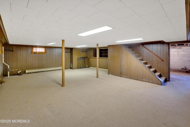 7 Tabor St, Little Silver, NJ 07739 - basement featuring a baseboard radiator, wood walls, stairs, and carpet floors