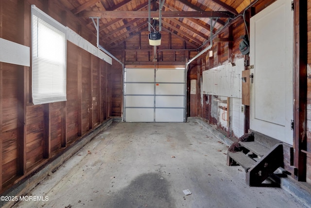 7 Tabor St, Little Silver, NJ 07739 - garage featuring a garage door opener and wooden ceiling