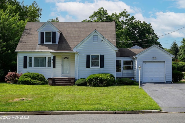7 Tabor St, Little Silver, NJ 07739 - cape cod house with asphalt driveway, a garage, and a front yard