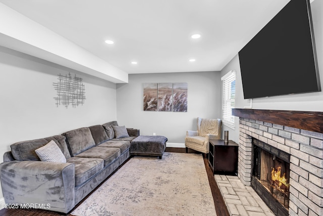 8 Blueberry Path, Howell, NJ 07731 - living area with a fireplace, recessed lighting, and brick floors