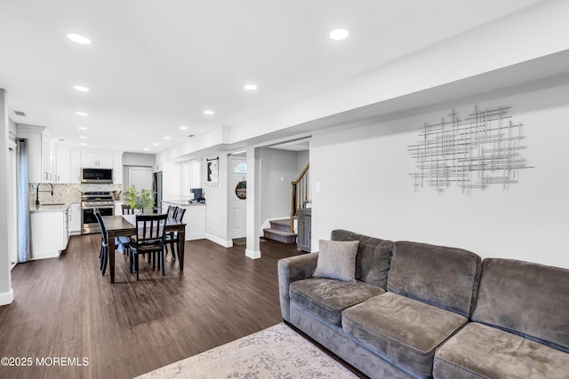 8 Blueberry Path, Howell, NJ 07731 - living room with stairs, dark wood-style floors, and recessed lighting