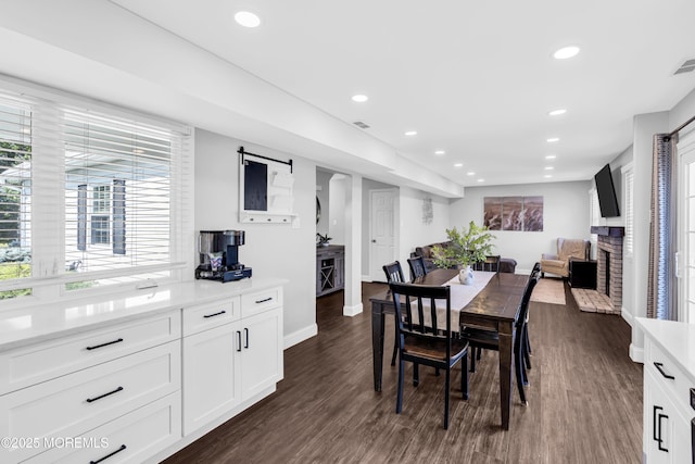 8 Blueberry Path, Howell, NJ 07731 - dining room with a barn door, dark wood-style flooring, and recessed lighting