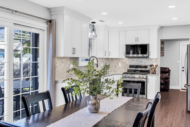 8 Blueberry Path, Howell, NJ 07731 - dining room featuring dark wood-type flooring and recessed lighting