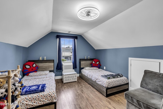 8 Blueberry Path, Howell, NJ 07731 - bedroom featuring wood finished floors and vaulted ceiling