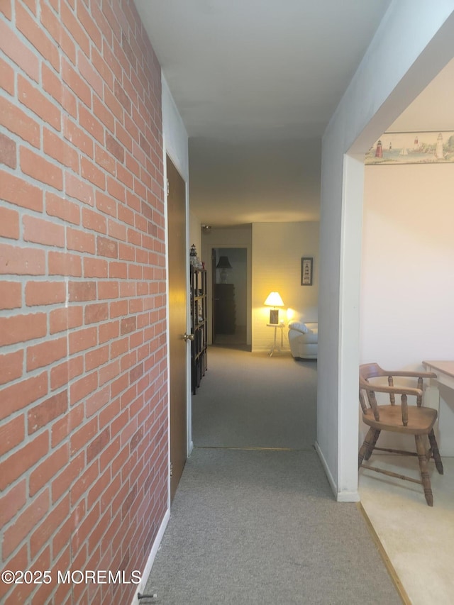 5B Lenape Dr, Whiting, NJ 08759 - hallway with brick wall and carpet