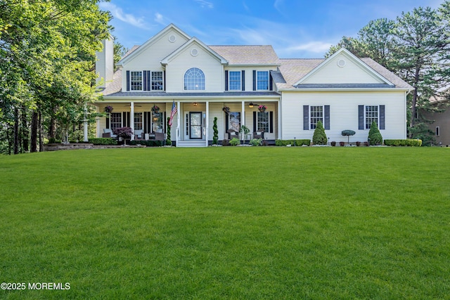 1 Opal Ct, Jackson, NJ 08527 - colonial home with a front yard, covered porch, a chimney, and ceiling fan
