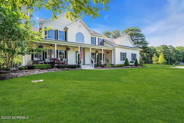 1 Opal Ct, Jackson, NJ 08527 - colonial house with ceiling fan, a front yard, and covered porch