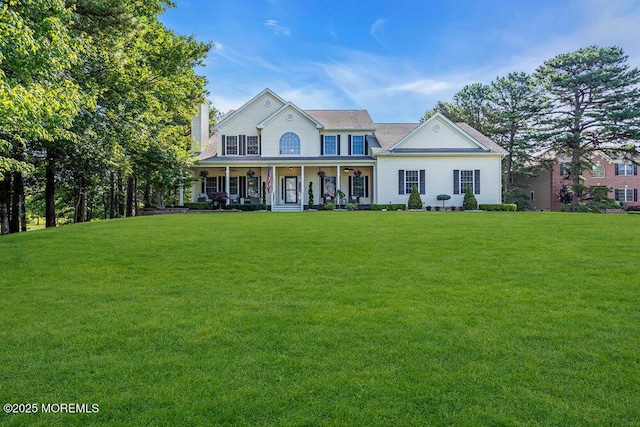 1 Opal Ct, Jackson, NJ 08527 - colonial-style house featuring covered porch and a front lawn