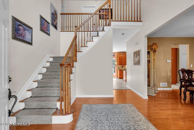 1 Opal Ct, Jackson, NJ 08527 - staircase with wood finished floors and a towering ceiling