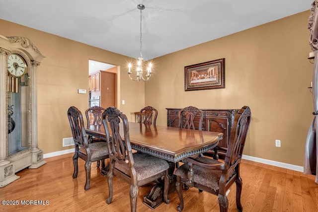 1 Opal Ct, Jackson, NJ 08527 - dining area featuring a chandelier and light wood finished floors