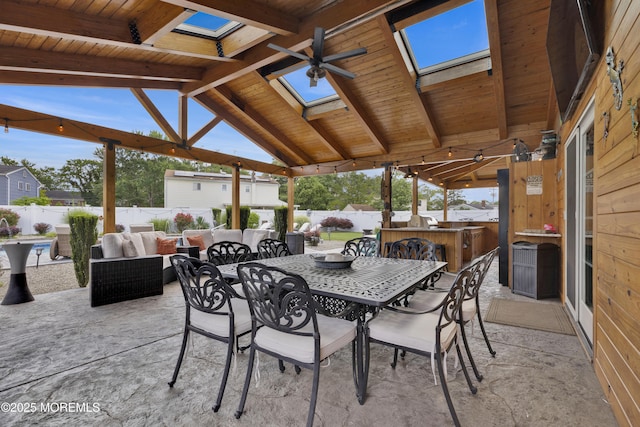 141 Twin Rivers Dr, Toms River, NJ 08753 - fenced backyard with ceiling fan, a patio, outdoor lounge area, and outdoor dining space