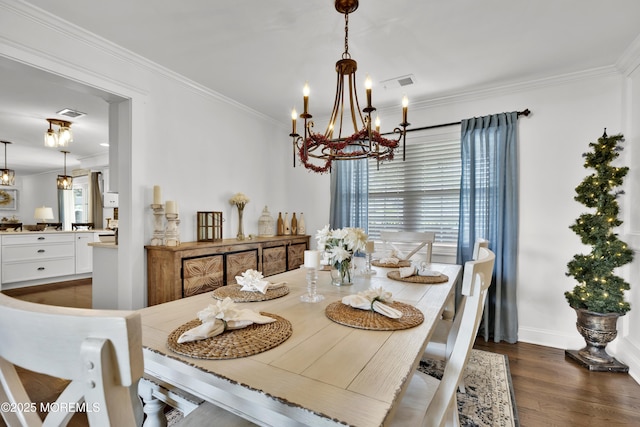 141 Twin Rivers Dr, Toms River, NJ 08753 - dining area featuring a chandelier, crown molding, and dark wood-type flooring