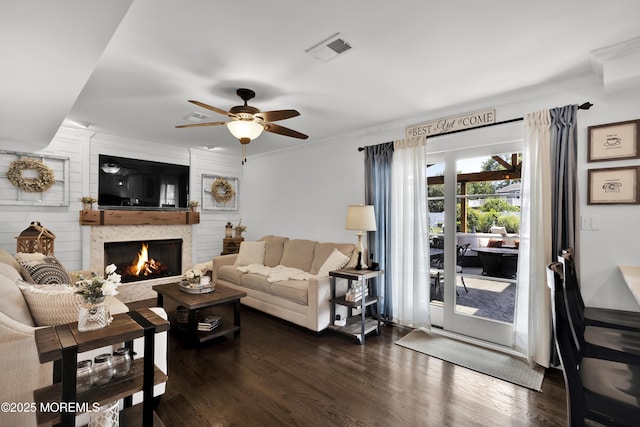 141 Twin Rivers Dr, Toms River, NJ 08753 - living room with a ceiling fan, dark wood-style floors, a lit fireplace, and ornamental molding