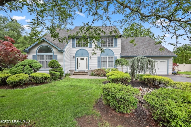 2 Independence Dr, Aberdeen, NJ 07747 - view of front of house featuring a shingled roof, an attached garage, and driveway