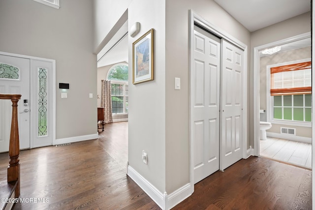 2 Independence Dr, Aberdeen, NJ 07747 - foyer entrance with dark wood-style floors
