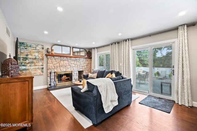 2 Independence Dr, Aberdeen, NJ 07747 - living area with a stone fireplace, wood finished floors, and recessed lighting
