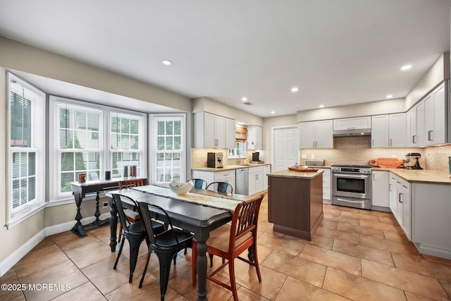 2 Independence Dr, Aberdeen, NJ 07747 - dining area with recessed lighting and light tile patterned floors
