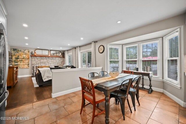 2 Independence Dr, Aberdeen, NJ 07747 - dining space with a fireplace, recessed lighting, and light tile patterned flooring