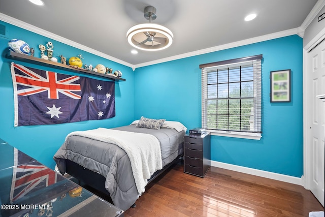 2 Independence Dr, Aberdeen, NJ 07747 - bedroom with crown molding, wood finished floors, recessed lighting, and a closet