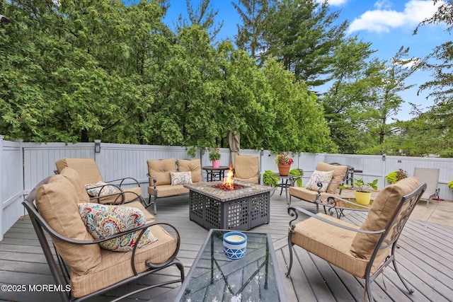 2 Independence Dr, Aberdeen, NJ 07747 - wooden terrace with an outdoor living space with a fire pit and a fenced backyard