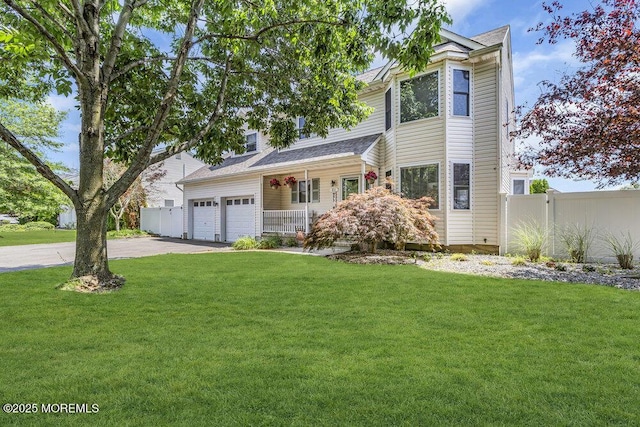 85 Mapletree Rd, Toms River, NJ 08753 - traditional-style house with asphalt driveway and a porch