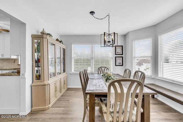 85 Mapletree Rd, Toms River, NJ 08753 - dining area featuring a chandelier and light wood-style flooring