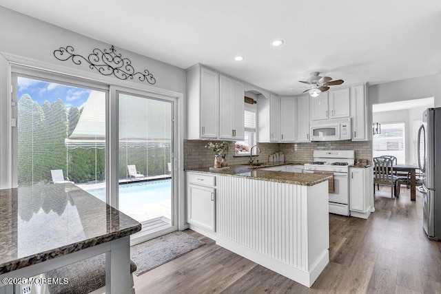 85 Mapletree Rd, Toms River, NJ 08753 - kitchen with white appliances, a ceiling fan, healthy amount of natural light, decorative backsplash, and recessed lighting