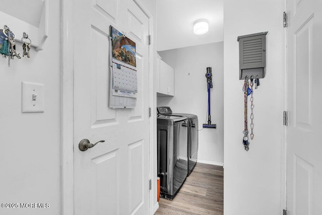 85 Mapletree Rd, Toms River, NJ 08753 - washroom featuring cabinet space, independent washer and dryer, and light wood-type flooring