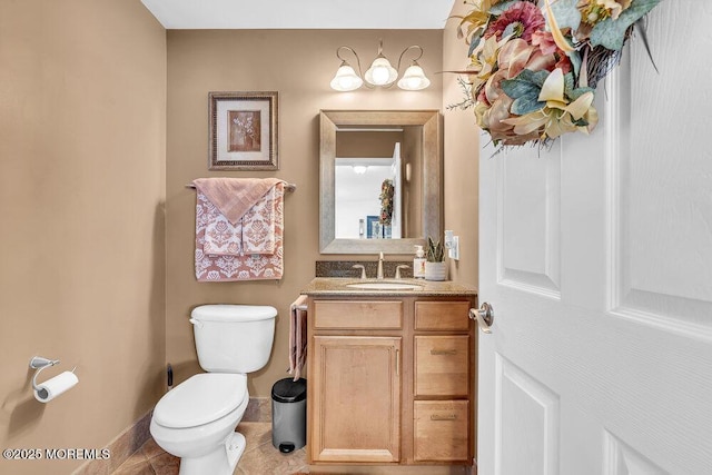 85 Mapletree Rd, Toms River, NJ 08753 - half bathroom with vanity and tile patterned floors
