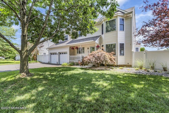 85 Mapletree Rd, Toms River, NJ 08753 - traditional-style home with concrete driveway, a garage, and a porch