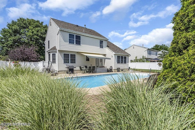 85 Mapletree Rd, Toms River, NJ 08753 - rear view of house with a fenced backyard, a patio, entry steps, and roof with shingles