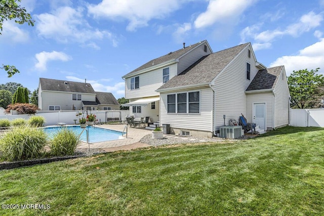85 Mapletree Rd, Toms River, NJ 08753 - rear view of house with a fenced backyard, a patio area, and roof with shingles
