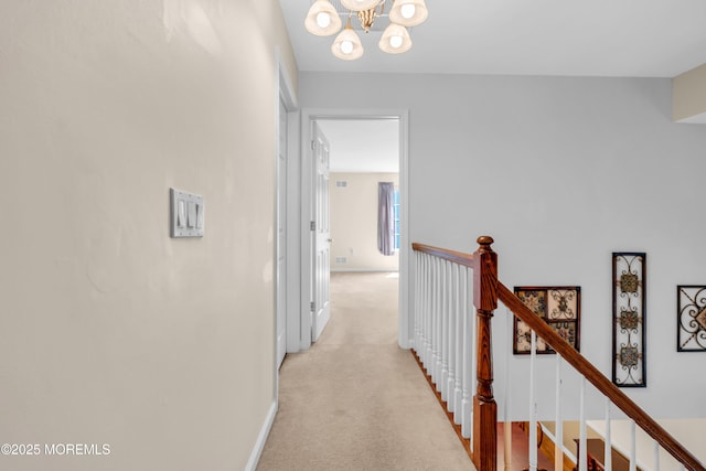252 Enclave Blvd, Lakewood, NJ 08701 - corridor with a chandelier, an upstairs landing, and light carpet