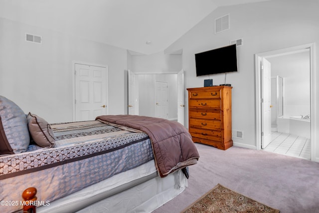 252 Enclave Blvd, Lakewood, NJ 08701 - bedroom with carpet floors, vaulted ceiling, and ensuite bathroom