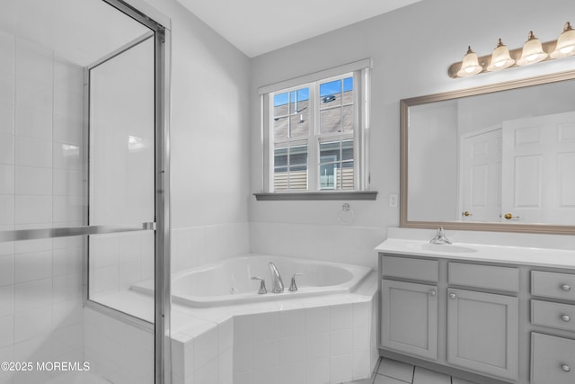252 Enclave Blvd, Lakewood, NJ 08701 - bathroom with a garden tub, vanity, and a stall shower