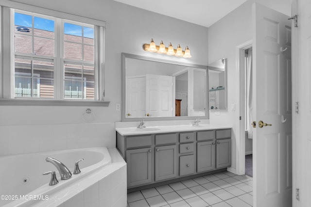 252 Enclave Blvd, Lakewood, NJ 08701 - full bath with double vanity, tile patterned floors, a whirlpool tub, and plenty of natural light