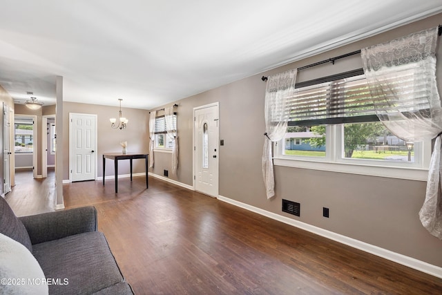 6 Redwood Rd, Howell, NJ 07731 - foyer entrance with a chandelier and wood finished floors