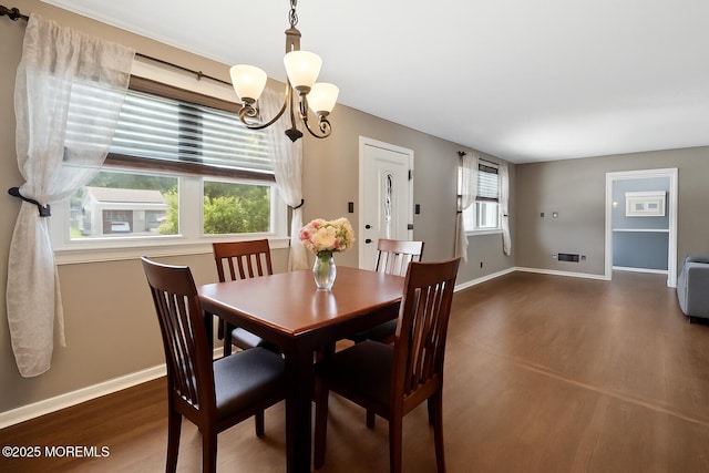 6 Redwood Rd, Howell, NJ 07731 - dining space with a chandelier and dark wood-type flooring