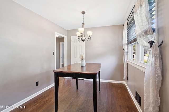 6 Redwood Rd, Howell, NJ 07731 - dining space with a chandelier and wood finished floors