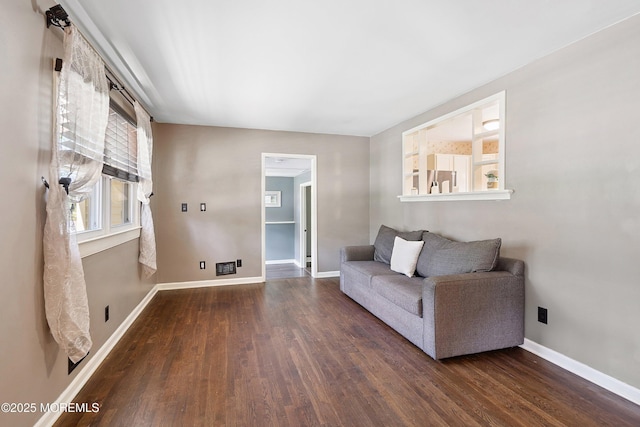 6 Redwood Rd, Howell, NJ 07731 - sitting room with wood finished floors and baseboards